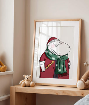 Festive hippo in a red outfit with a green snowflake scarf