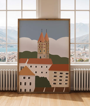 Ciudad europea encantadora con torres de iglesia y edificios coloridos