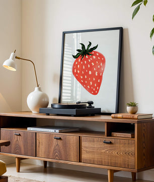 Illustrative design of a vibrant red strawberry with green leaves