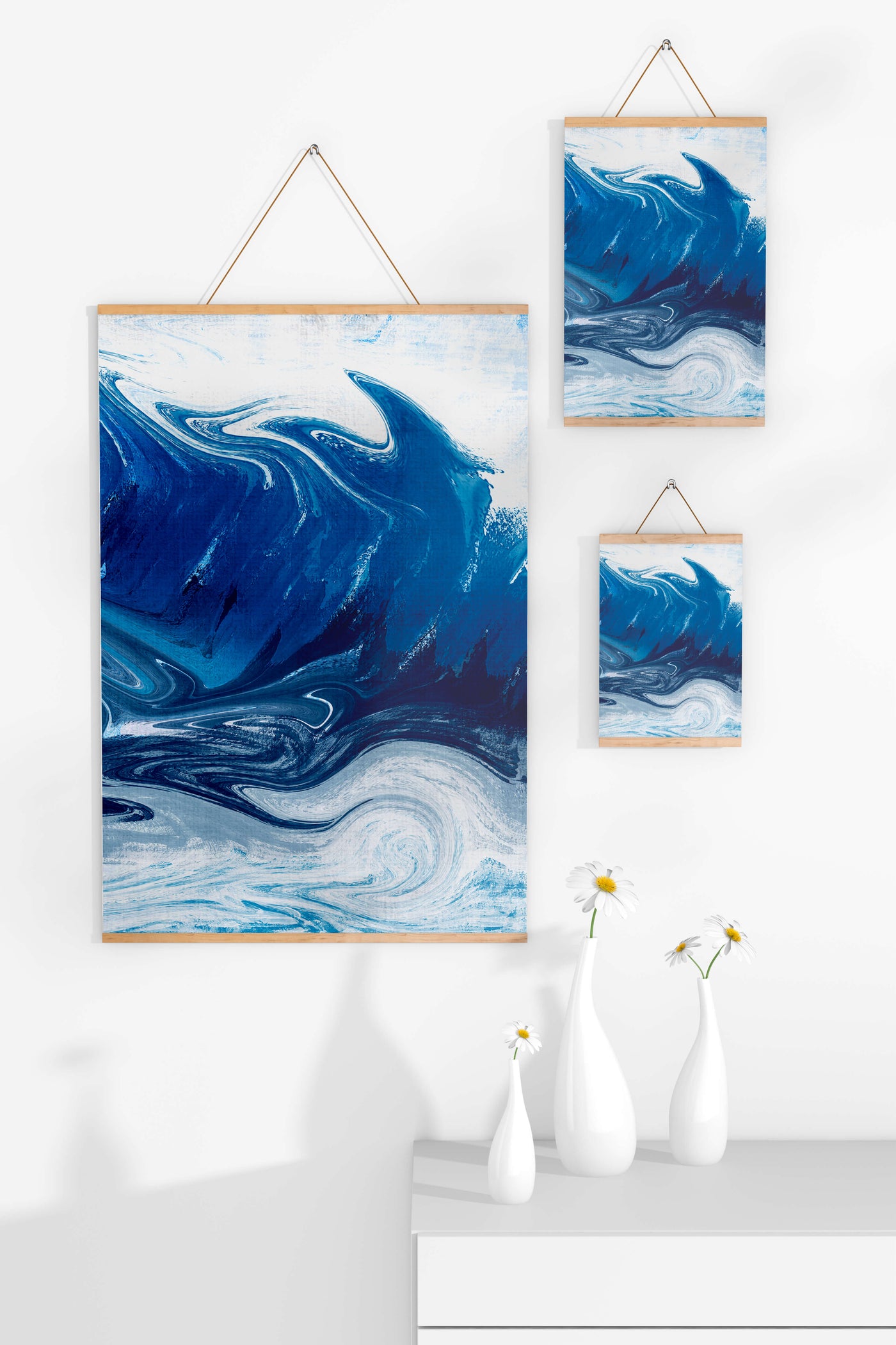Abstract blue and white ocean wave painting with swirling patterns