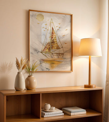Elegant sailboat with gold elements against a textured sky