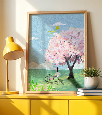 Springtime scene with cherry blossom and girl with bicycle