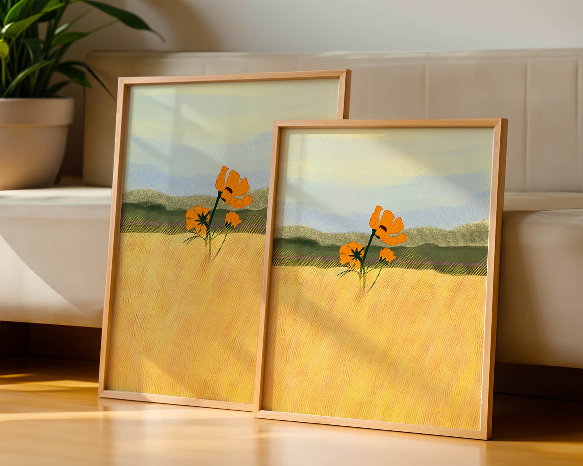 Orange Flowers in a Golden Field with Mountains and Blue Sky