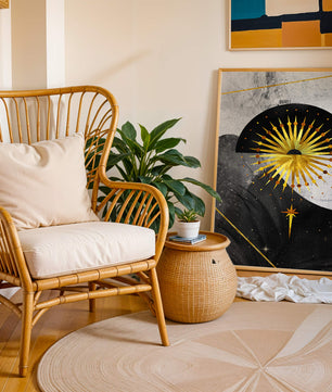 Abstract cosmic design featuring golden sunburst and celestial elements