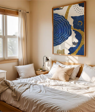 Abstract blue and gold textured artwork with wave patterns