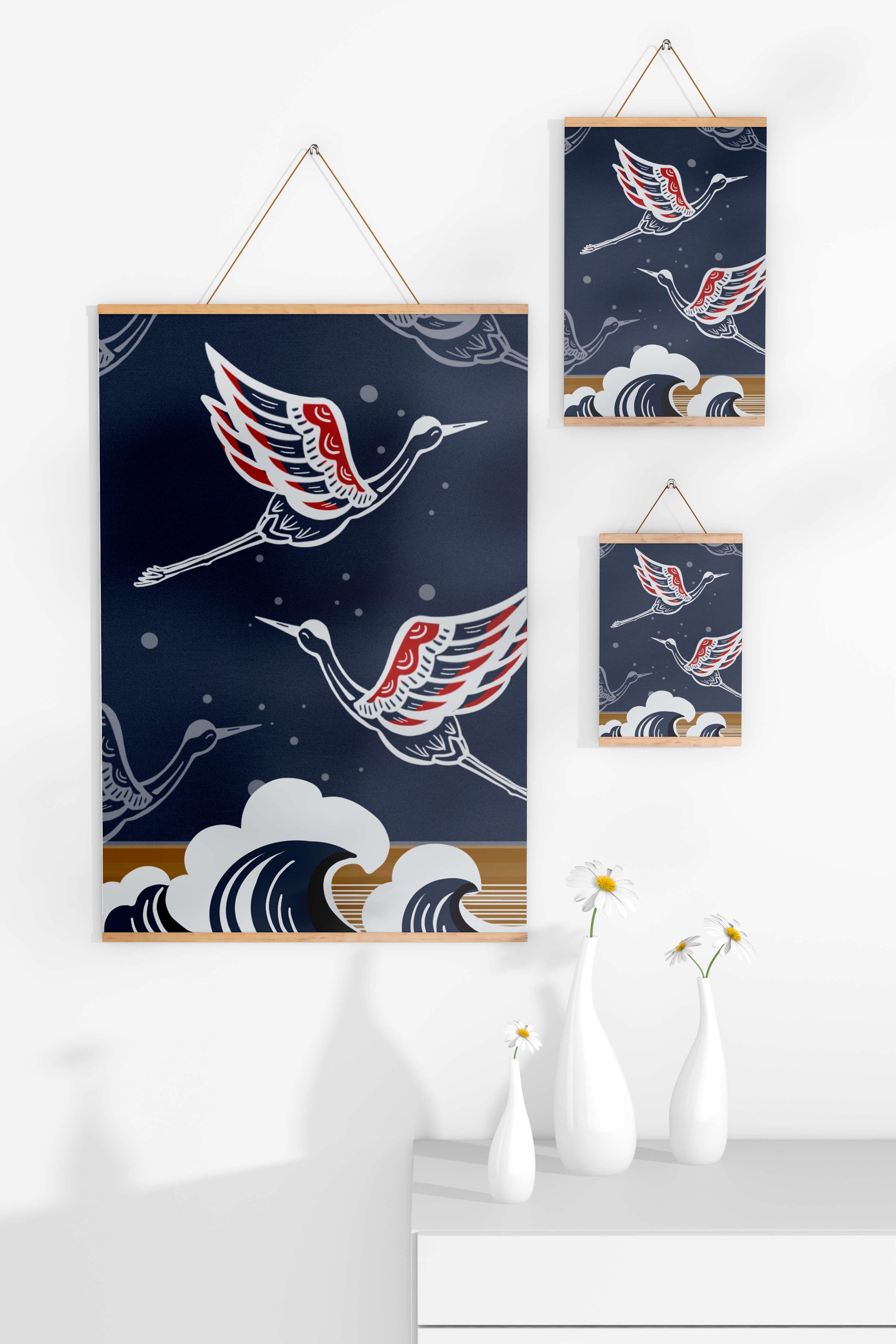 Illustrative cranes flying over ocean waves with dark background