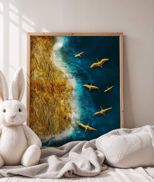 Golden beach landscape with vibrant ocean and flying seabirds