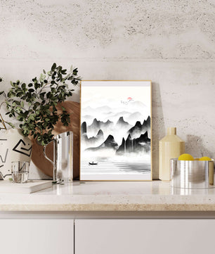 Peaceful mountain landscape with mist and rising sun