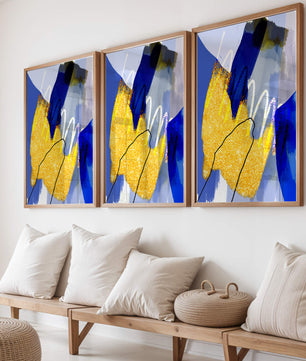 Pintura abstracta azul y amarilla con detalles dorados