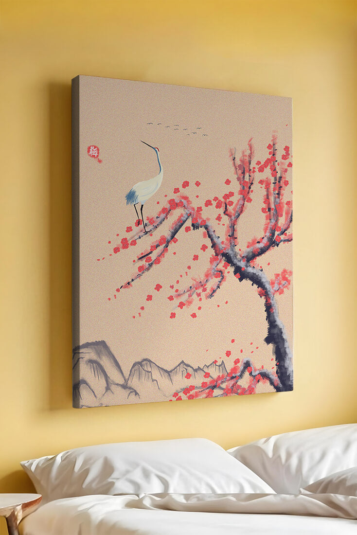 Elegant crane on cherry blossom tree with mountainous background