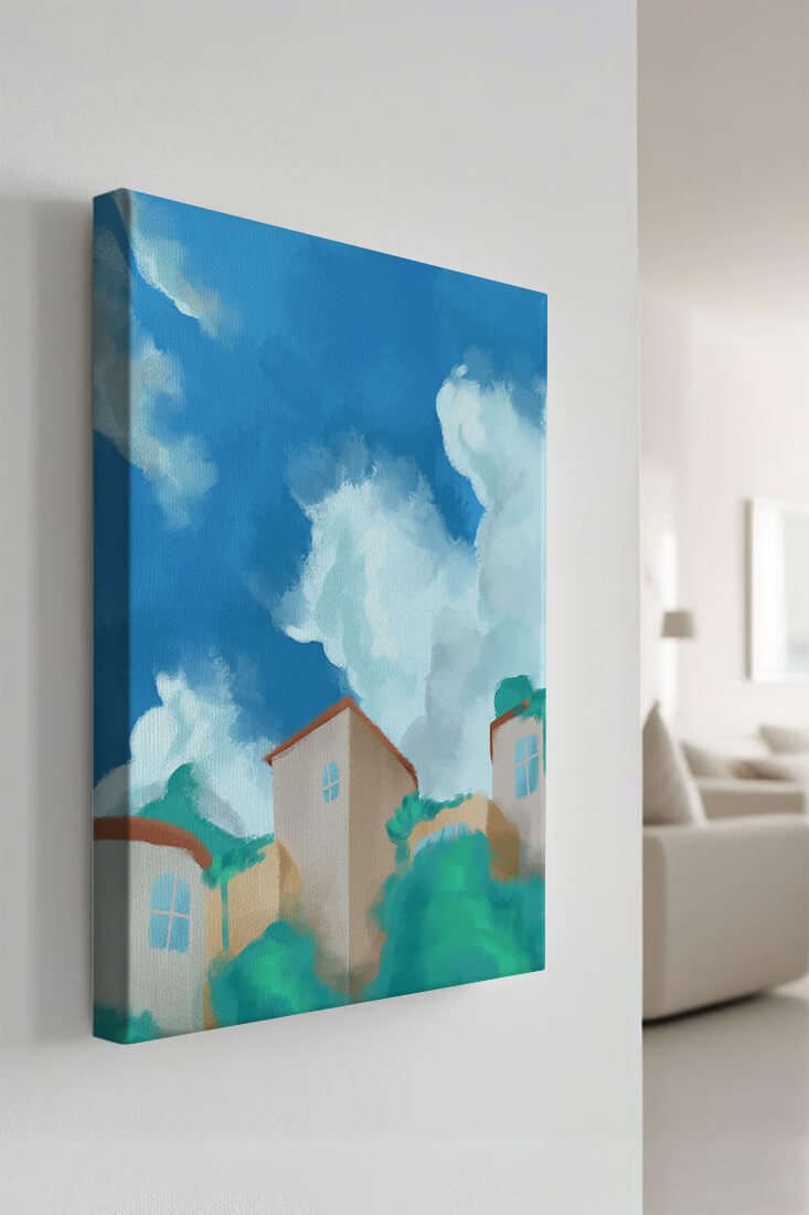 Serene landscape with houses and fluffy clouds against a blue sky