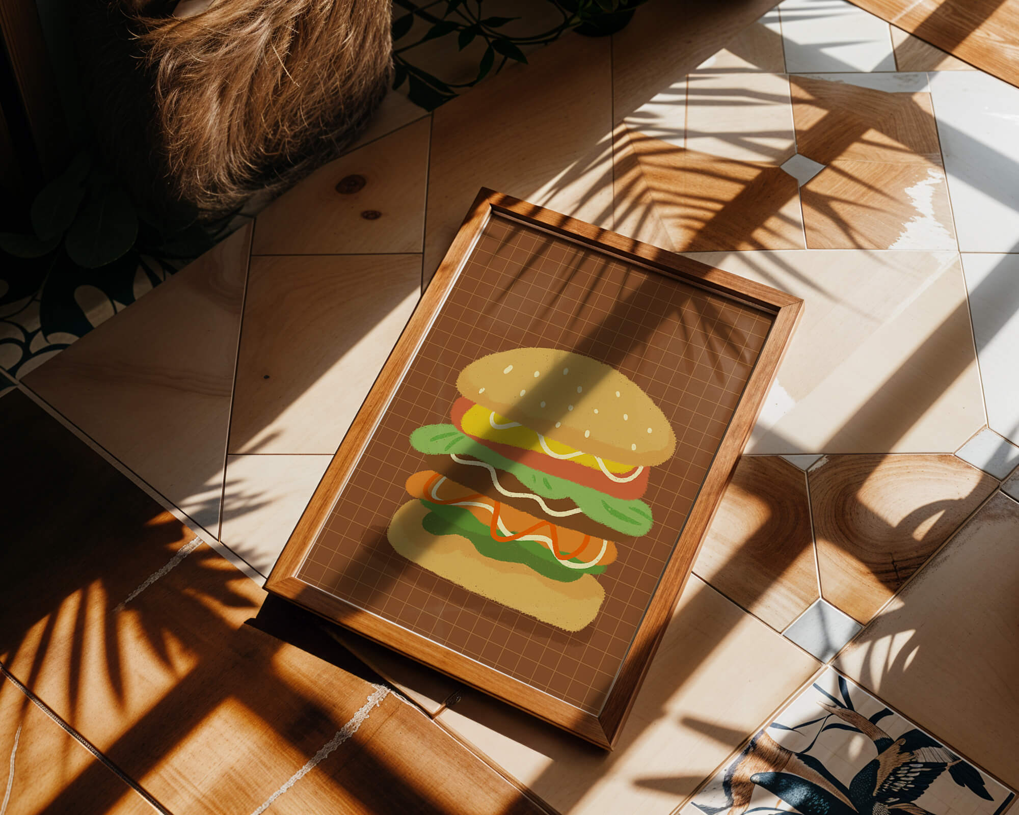 Illustrated cheeseburger with colorful layers on a grid background