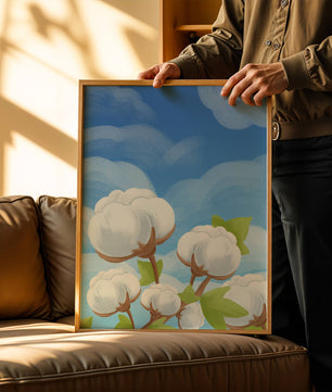 Künstlerische Illustration von Baumwollpflanzen vor einem klaren blauen Himmel