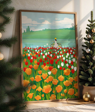 Woman with bicycle in vibrant tulip field by a lake
