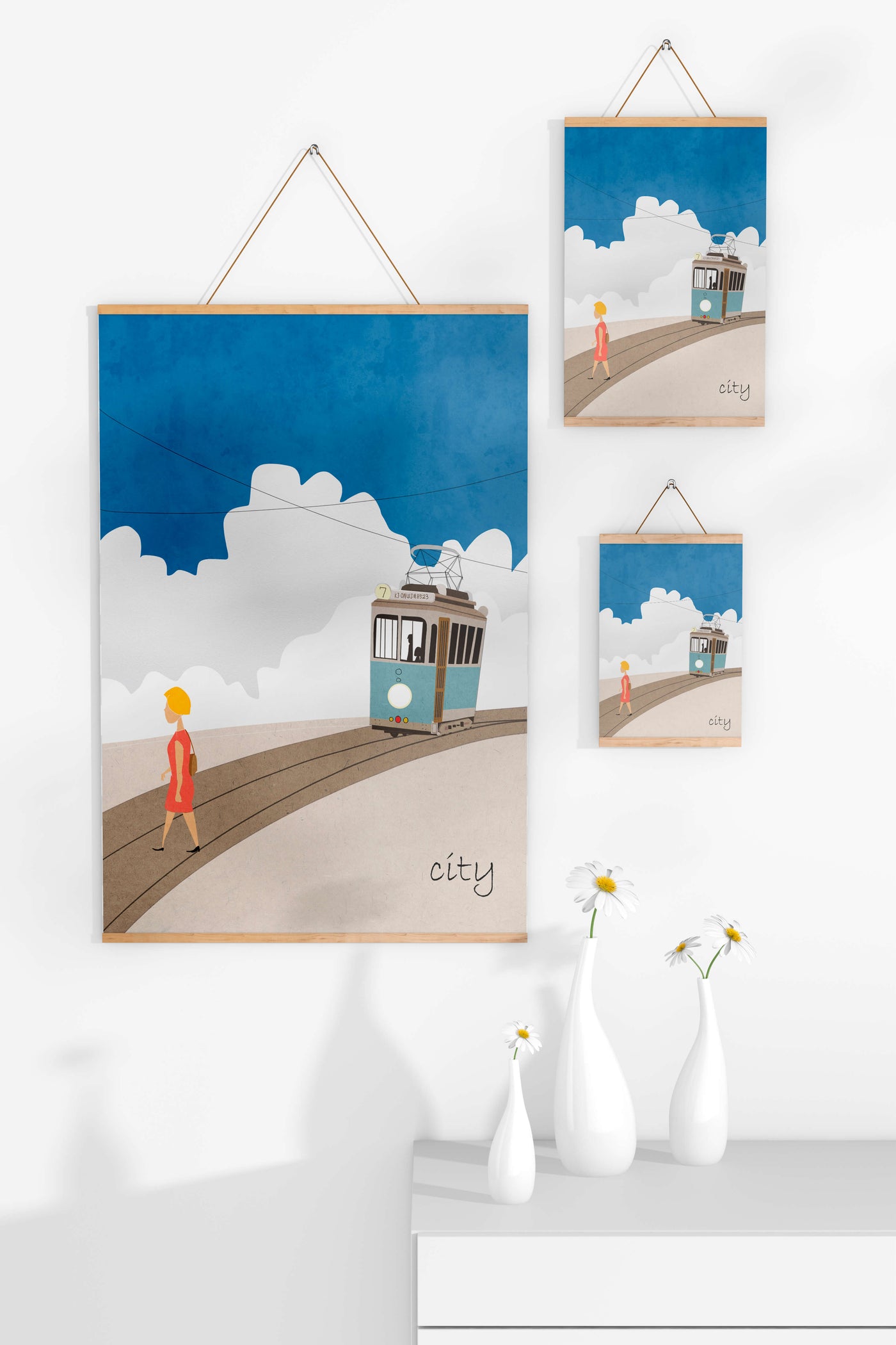 Urban scene with tram and pedestrian under a blue sky