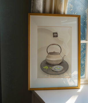 Traditional Japanese teapot with steaming tea and serene setting