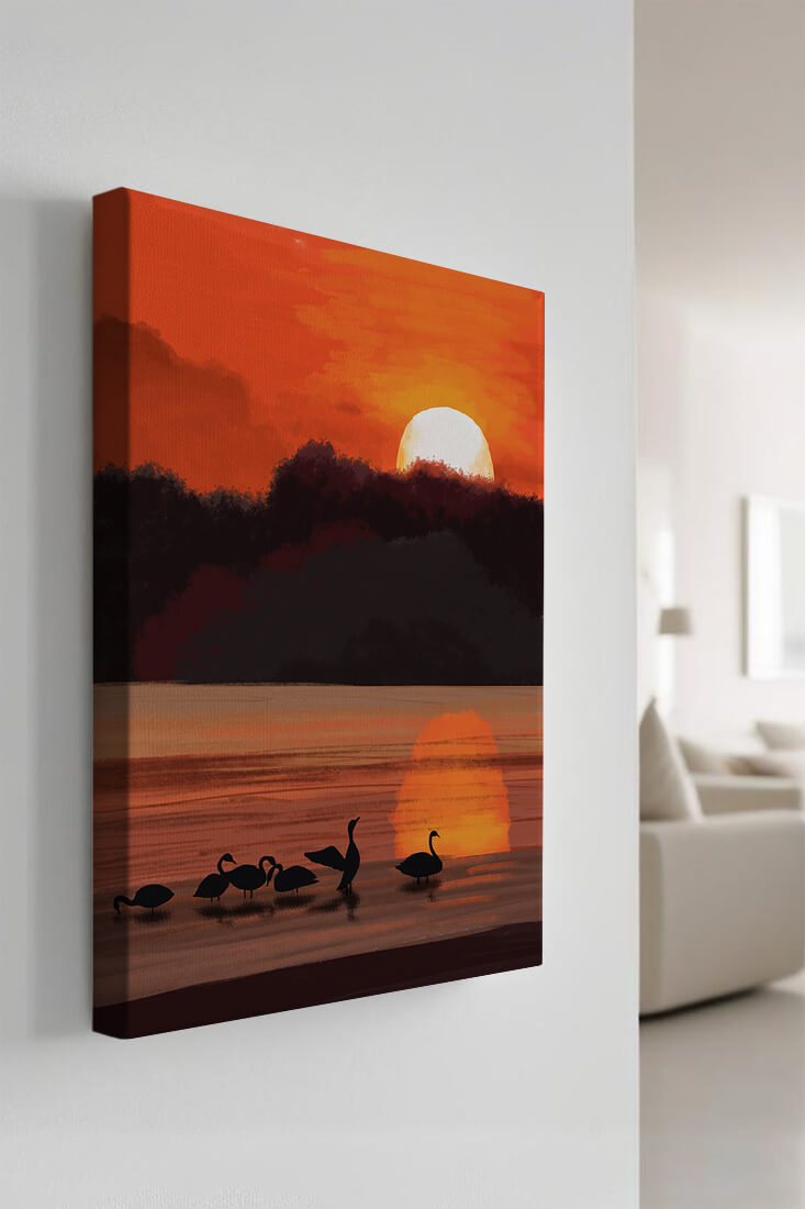 Serene sunset over a lake with silhouetted swans