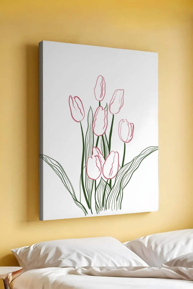 Wunderschöne rosa Tulpen mit grünen Blättern auf einer minimalistischen Leinwand
