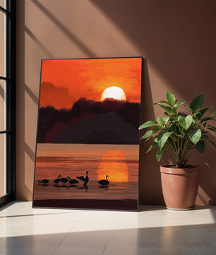 Ruhiger Sonnenuntergang über einem See mit Schwanensilhouette