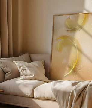 Elegant golden feather design with shimmering background