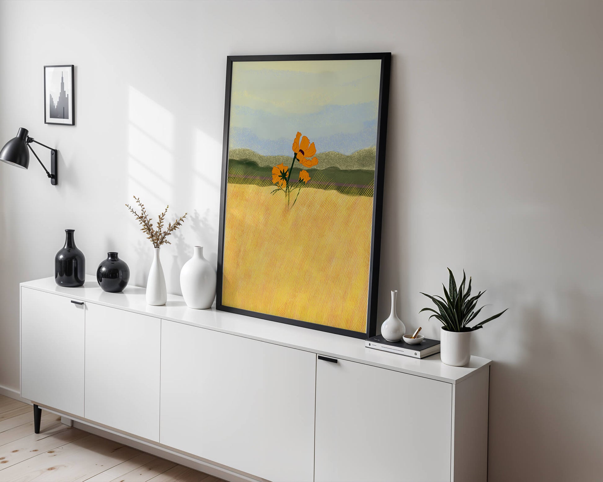 Orange Flowers in a Golden Field with Mountains and Blue Sky