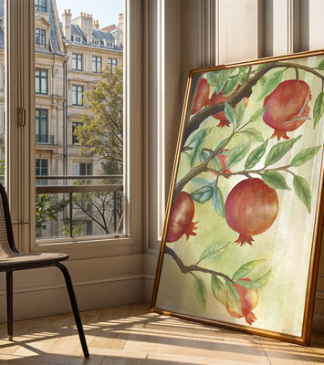Watercolor illustration of pomegranates on a branch with leaves