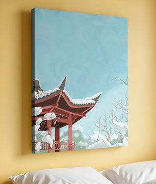 Snow-covered traditional pagoda under a clear blue sky