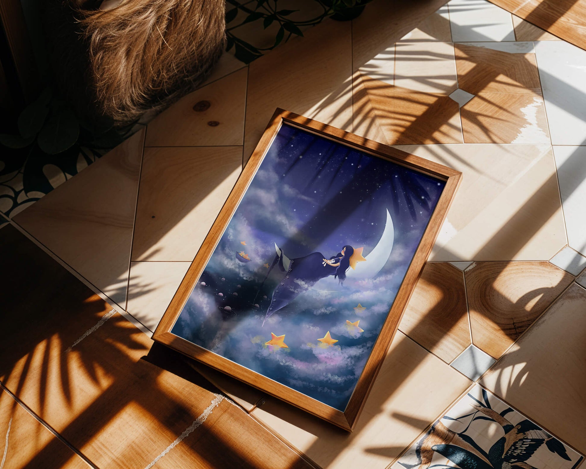 Dreamy night sky with girl sitting on crescent moon surrounded by stars