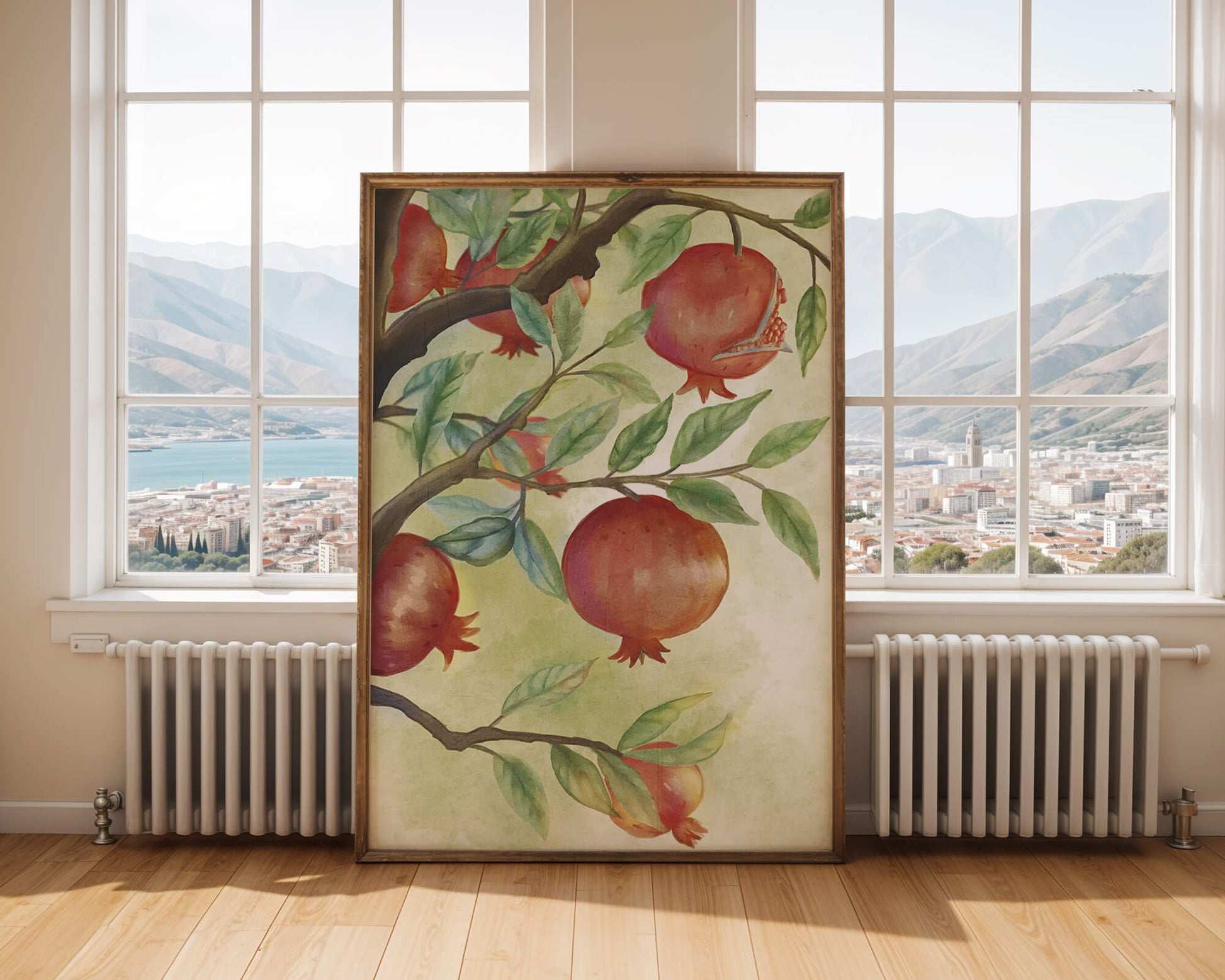 Watercolor illustration of pomegranates on a branch with leaves