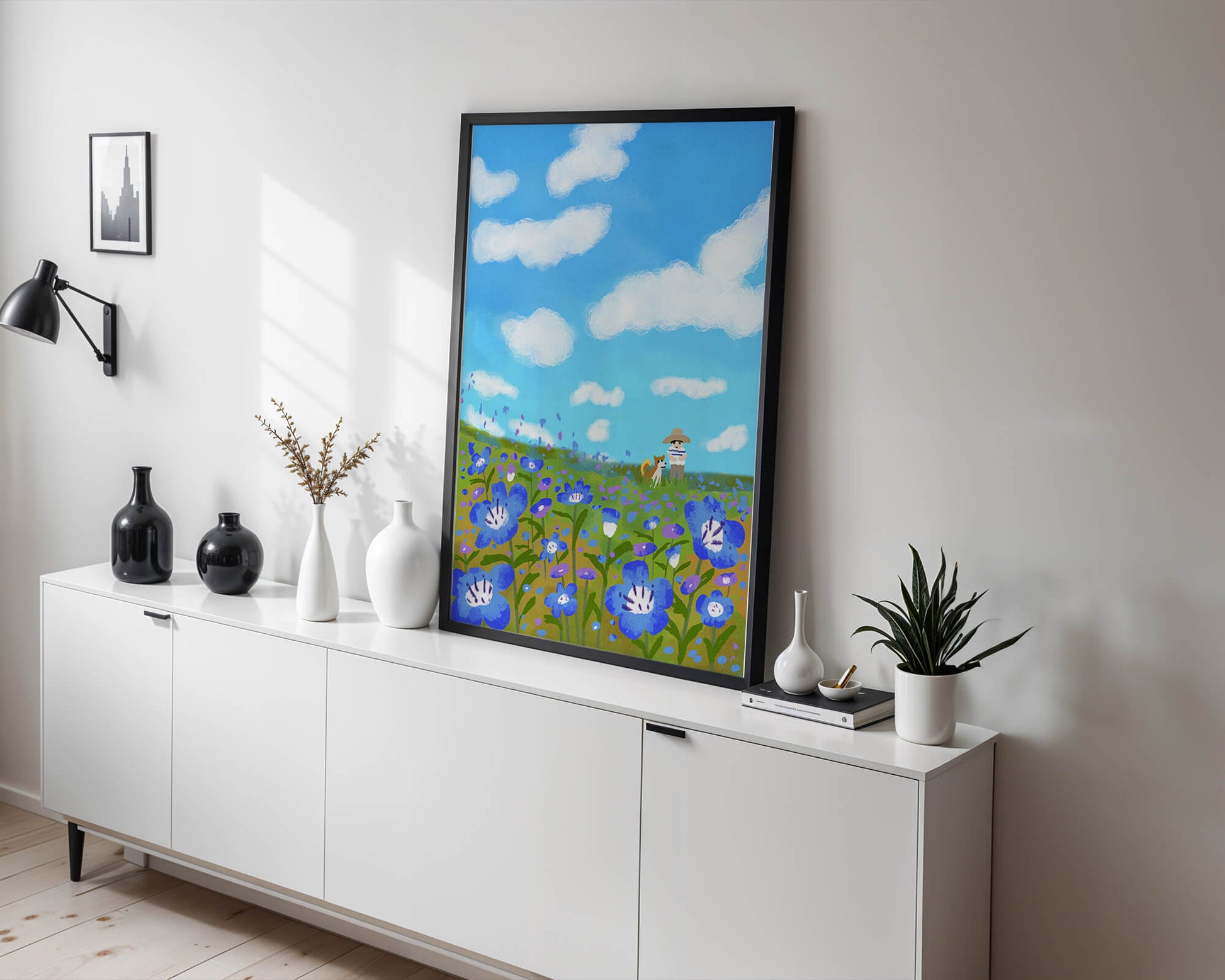 Man and dog in vibrant flower meadow under blue sky