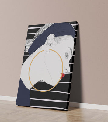Profile of woman with hoop earrings and striped headscarf