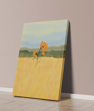 Orange Flowers in a Golden Field with Mountains and Blue Sky