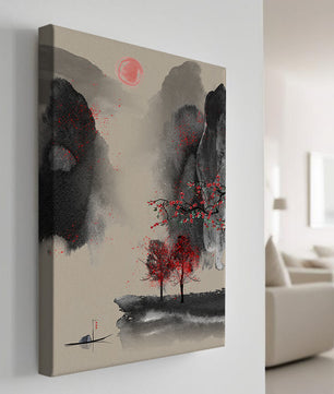 Serene landscape with red foliage and misty mountains