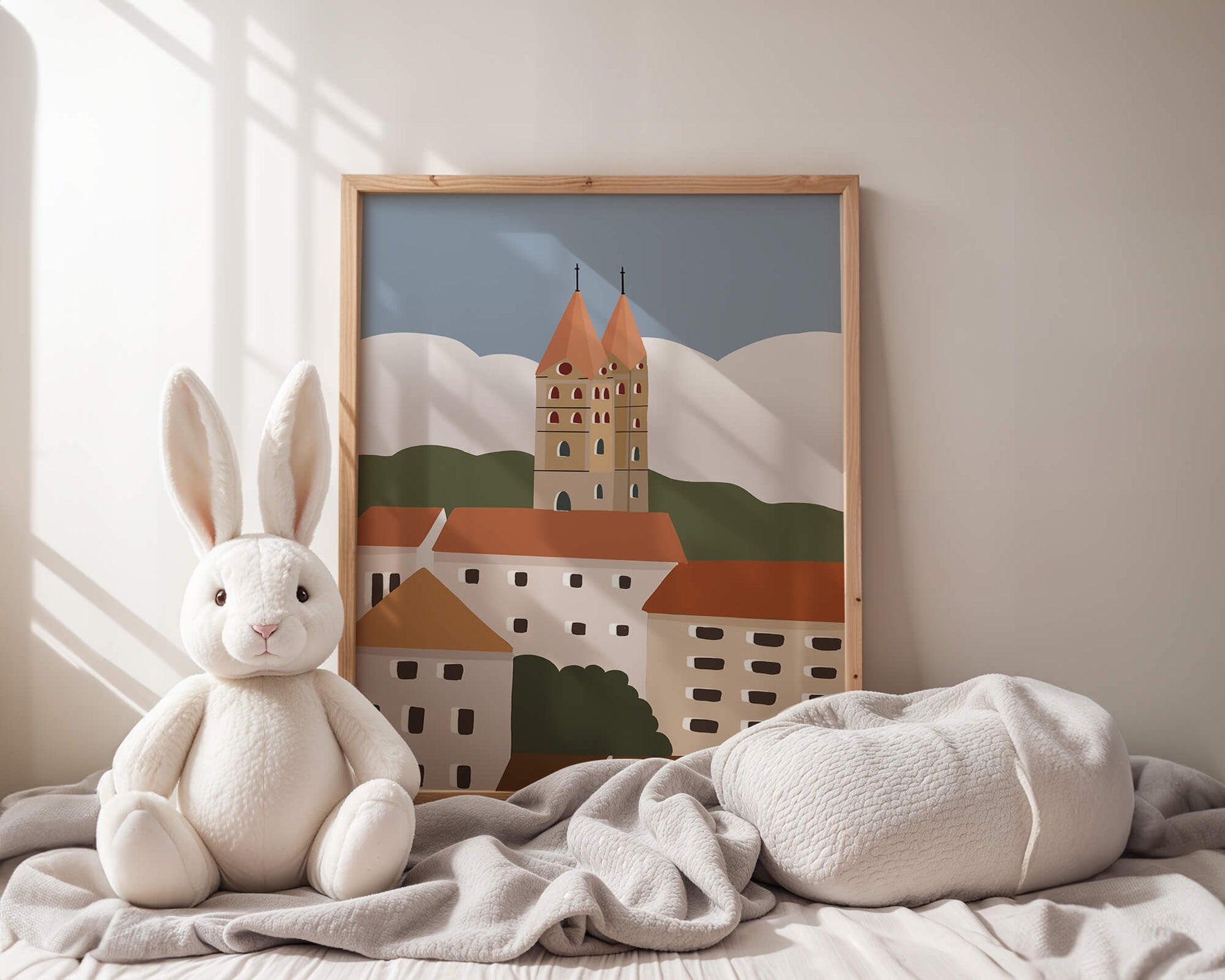 Charming European Cityscape with Church Towers and Colorful Buildings