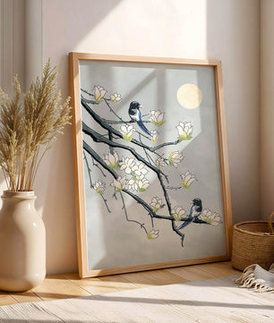 Birds on blossoming branches under a serene moonlit sky