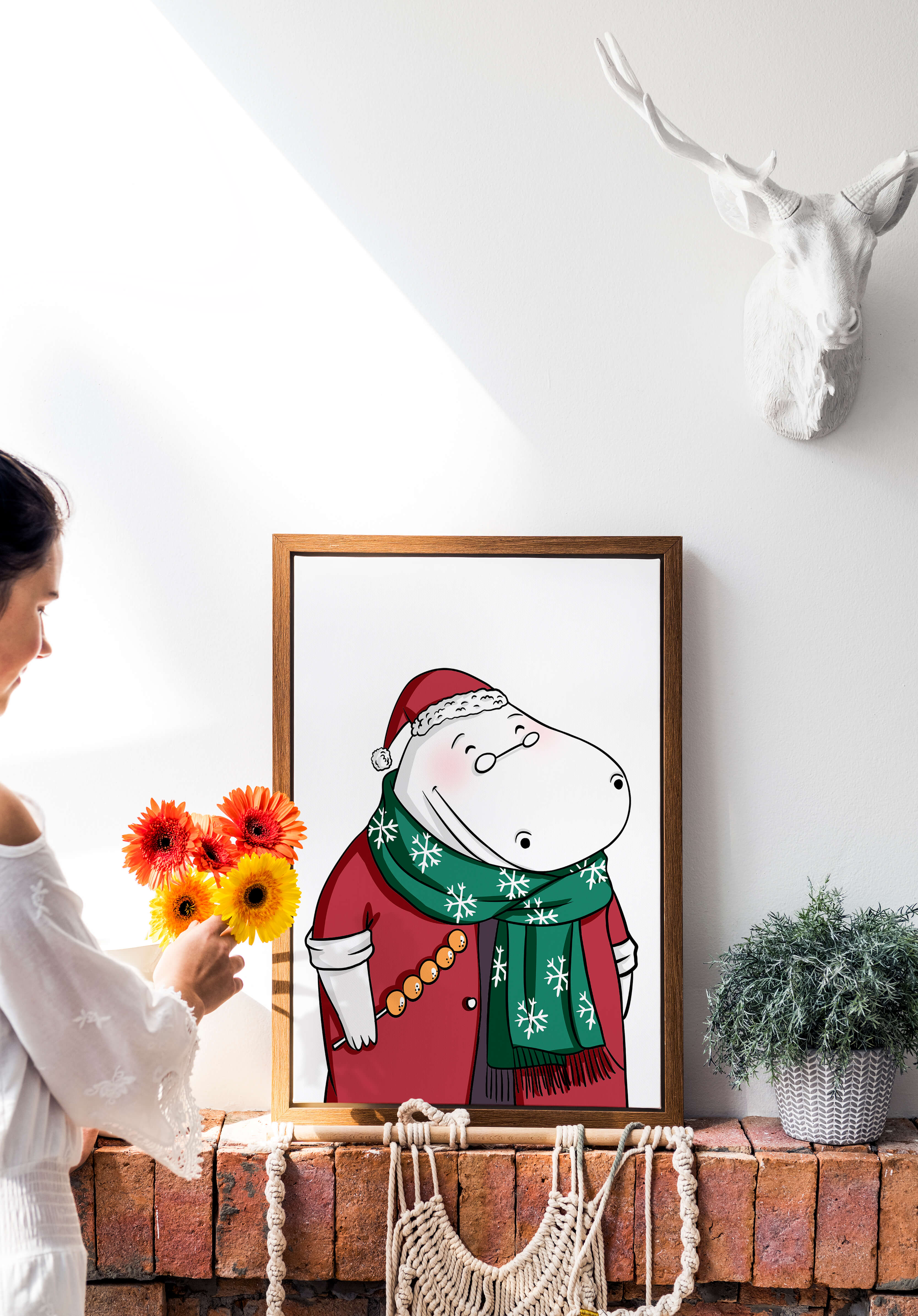 Festive hippo in a red outfit with a green snowflake scarf