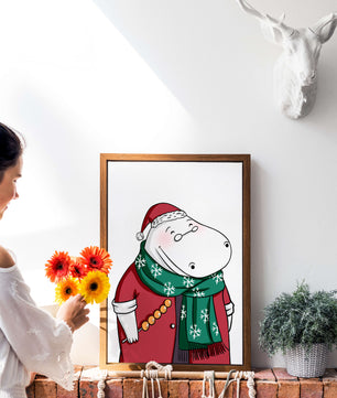 Festive hippo in a red outfit with a green snowflake scarf