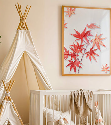 Delicate red maple leaves on white background