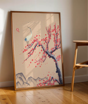 Elegant crane on cherry blossom tree with mountainous background