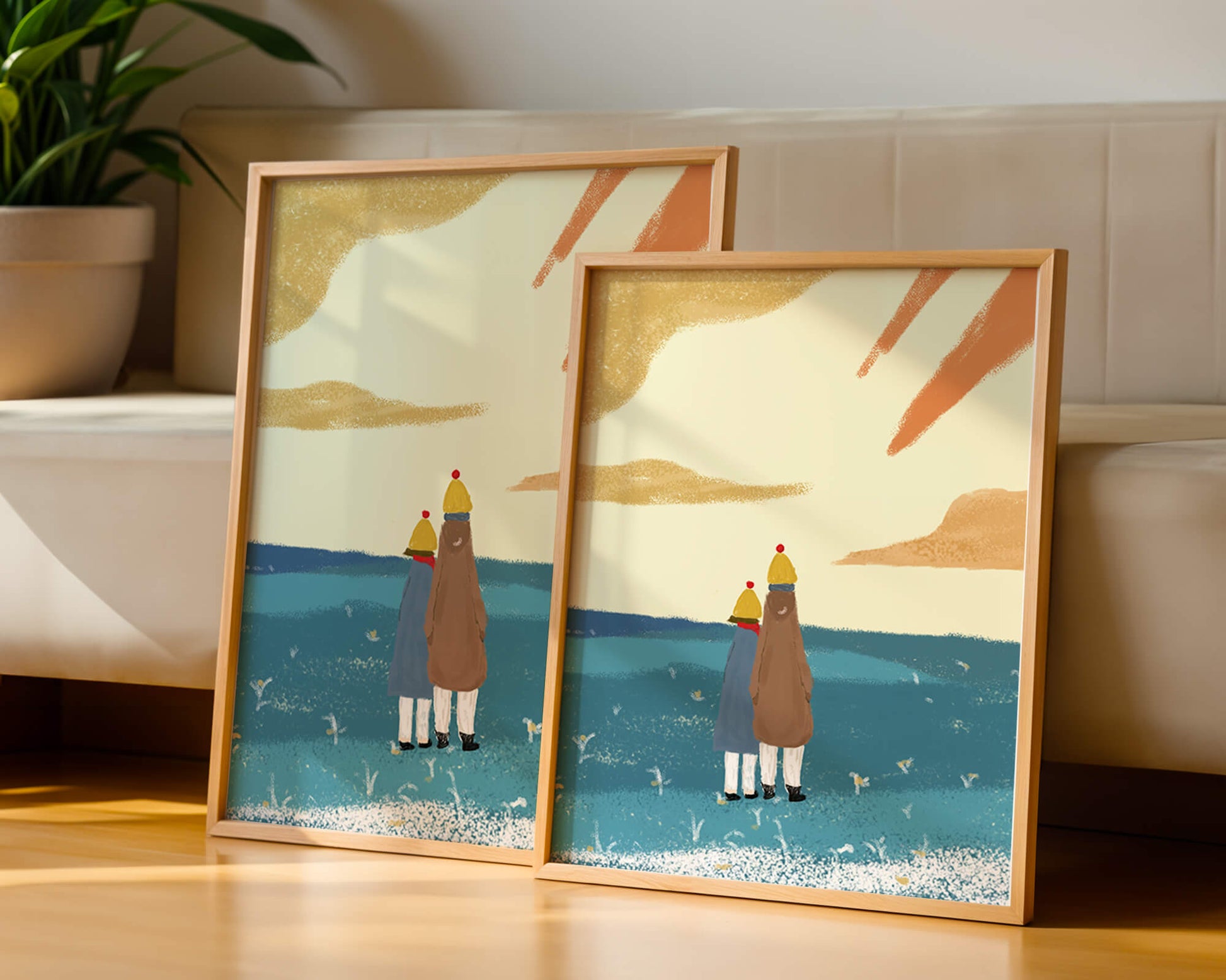 Two figures in winter clothing on a serene beach