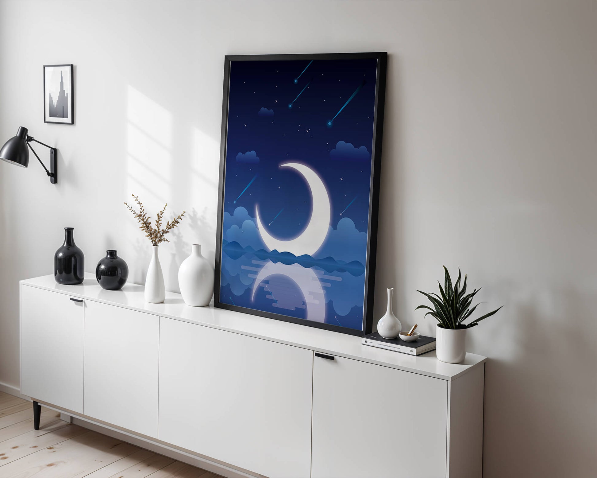 Serene night sky with crescent moon reflecting on water