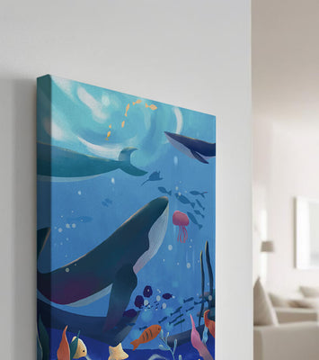 Underwater scene with whales, fish, and coral reef
