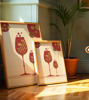 Stylish wine glasses with gold accents and a festive theme