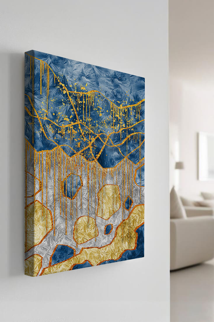 Abstract gold and blue textured art with dynamic splashes of color
