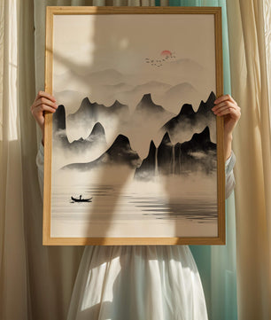 Peaceful mountain landscape with mist and rising sun