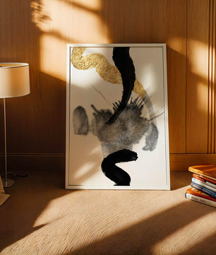 Abstract black and gold brushstrokes with textured patterns
