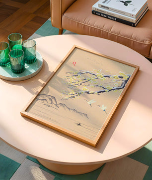 Tranquil landscape with blooming branches and flying cranes