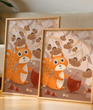 Orange Squirrel with Acorn in Autumn Forest
