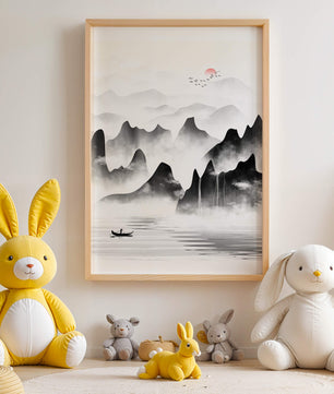 Peaceful mountain landscape with mist and rising sun