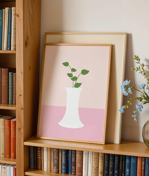 Simple Minimalist Illustration of a White Vase with Green Leaves on a Pink Background - Mi tienda